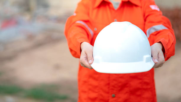 istock A construciton foreman with safety helmet at construction site. 2163804676