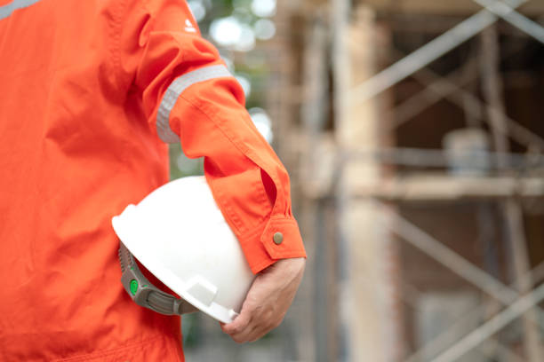 istock A construciton foreman with safety helmet at construction site. 2163804716