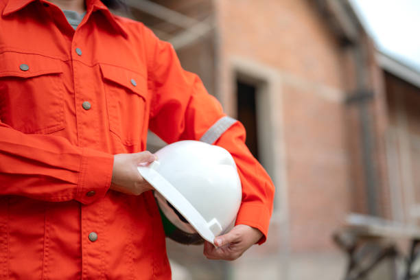istock A construciton foreman with safety helmet at construction site. 2163804735