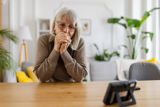 istock Elderly woman feeling cold at home 2163804757