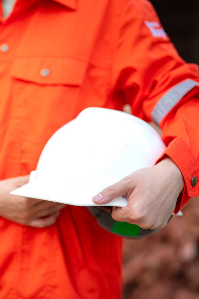 istock A construciton foreman with safety helmet at construction site. 2163804772