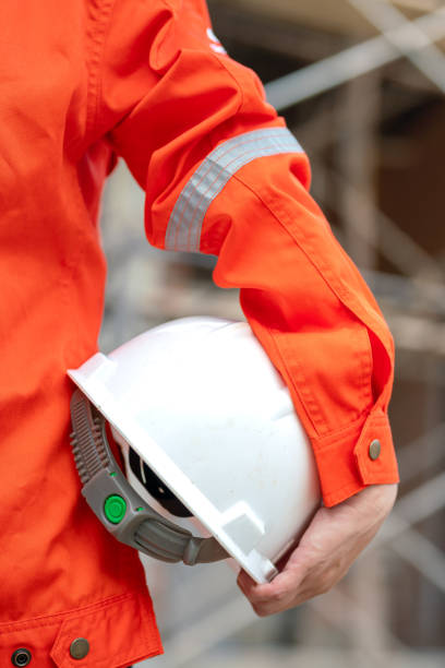istock A construciton foreman with safety helmet at construction site. 2163804776