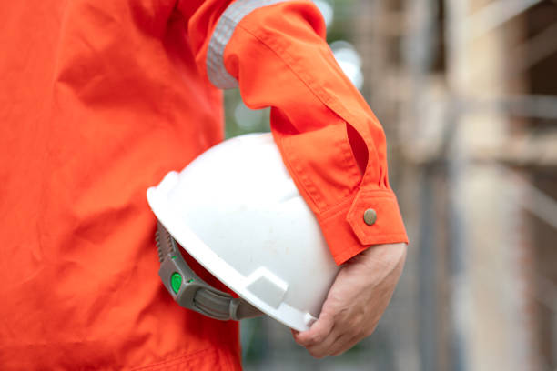 istock A construciton foreman with safety helmet at construction site. 2163804788