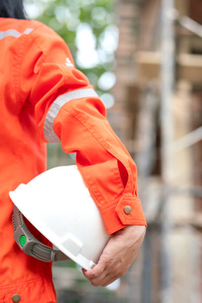 istock A construciton foreman with safety helmet at construction site. 2163804791