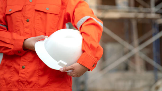 istock A construciton foreman with safety helmet at construction site. 2163804817
