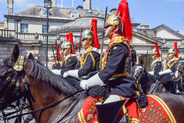 LONDON - MAY 30:  The guard ceremony at Buckingham Palace on May 30, 2015 in London, which is one of England's most popular visitor attractions.