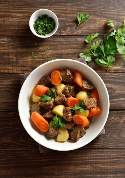 istock Beef meat stewed with potatoes, carrots and spices 2163808764