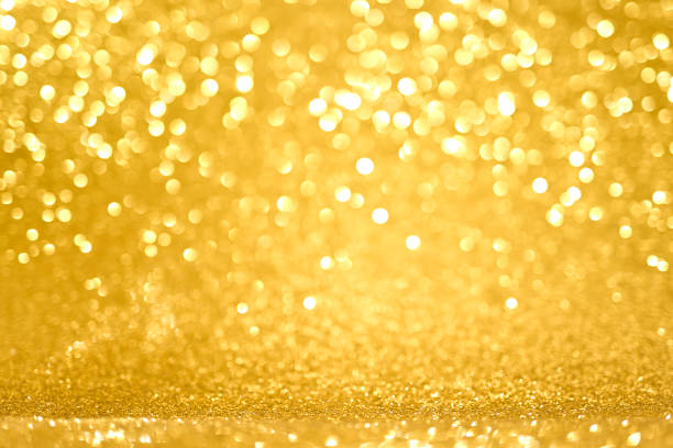Abstract blur glowing golden color panoramic background.