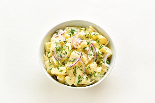 istock Potato salad with egg, pickle, red onion with mayonnaise and yogurt dressing 2163816653