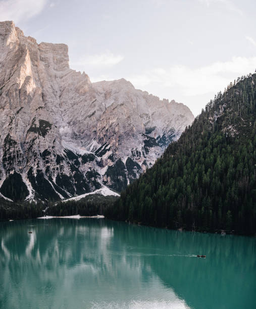 istock Alpine lake and mountains 2163818679