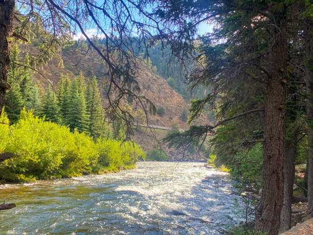 istock Clear Creek river running downstream on a bright morning in July 2163819099