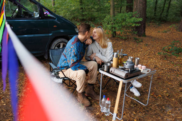 istock Peaceful Moments: Young Couple Resting by Their Camper 2163824358