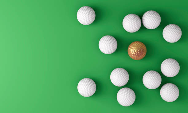 istock Gold golf ball among many white golf balls 2163828011
