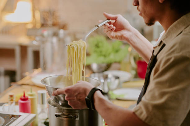 istock Young Sous Chef Cooking Pasta 2163829186