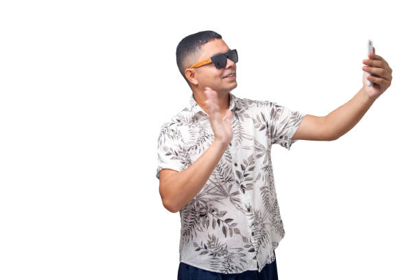 istock Man on vacation with sunglasses and smartphone. 2163829547