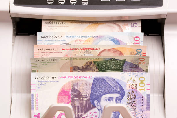 istock Georgian lari in the counting machine 2163830313