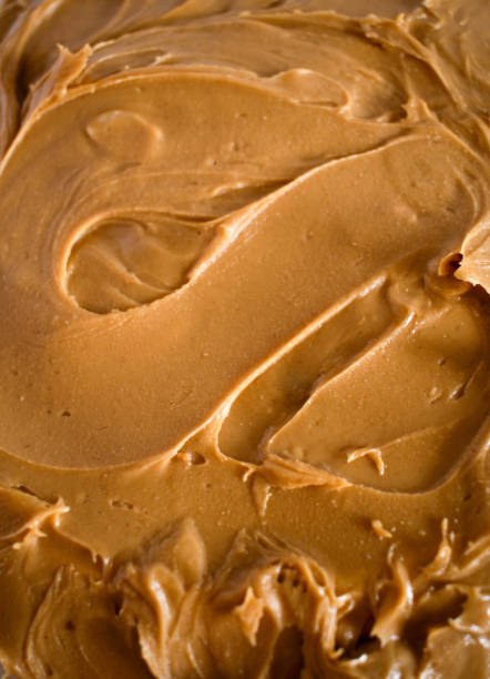 istock Peanut butter texture background stock photo 2163830761