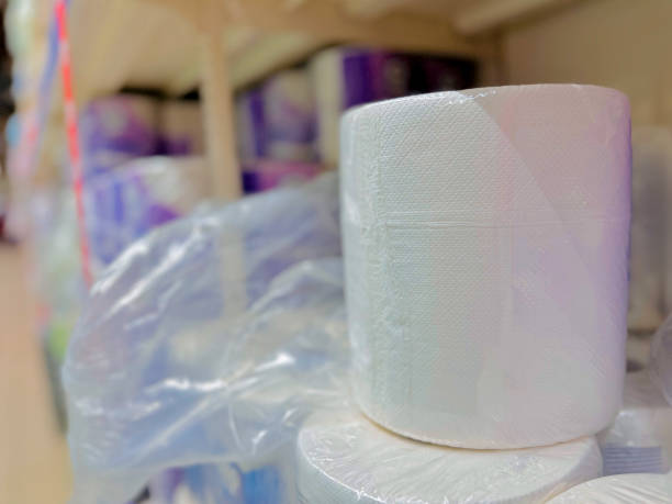 Multiple rolls of paper towels wrapped in transparent plastic, likely for bulk sale.
