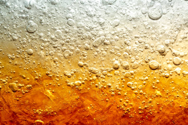 istock Macro cola background,Background of cola with ice and bubbles. Side view background of refreshing cola flavored soda with carbonated with vintage tone,Thailand, Turkey - Middle East, Cola, Soda, Bubble 2163845810