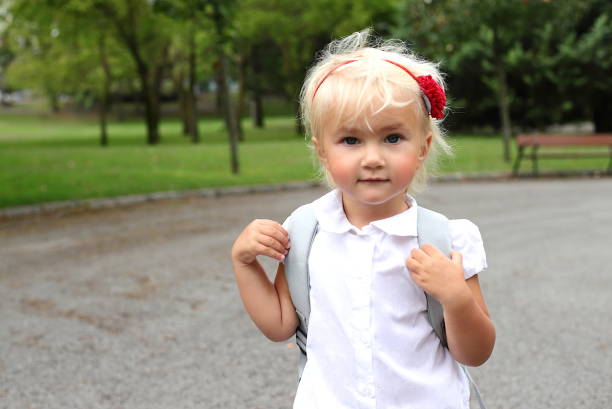 Little girl going to school first time, study concept