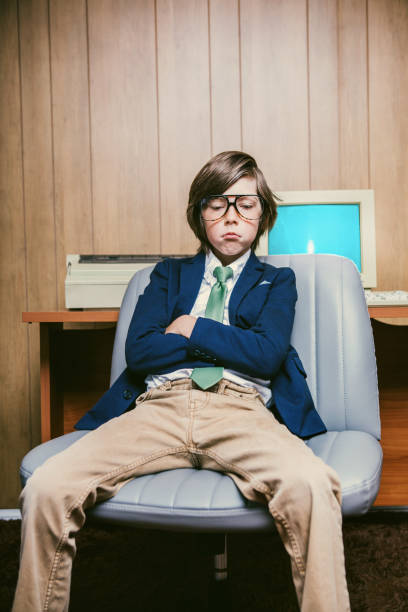 istock Bored Child Prodigy Office Employee 2163848048