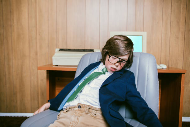 istock Child Prodigy Office Employee Is Tired 2163848118