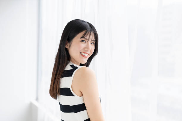 istock attractive asian woman relaxing 2163856497