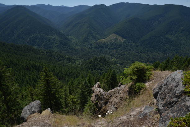 istock Looking down towards a extremely steep rocky ridge from the top 2163858021
