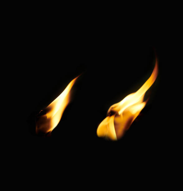 Set of flame burning isolated on dark background