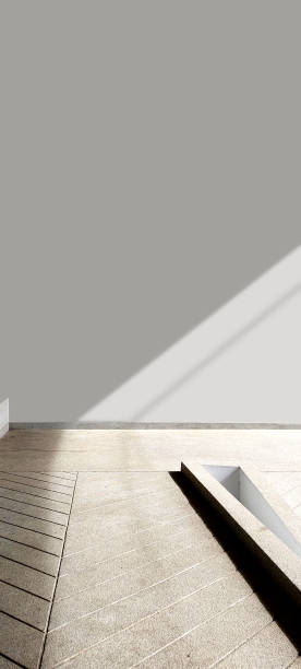 istock shadow on gray wall and cement walk way copy space 2163867276