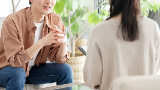 istock Asian man receiving psychological counseling 2163869643