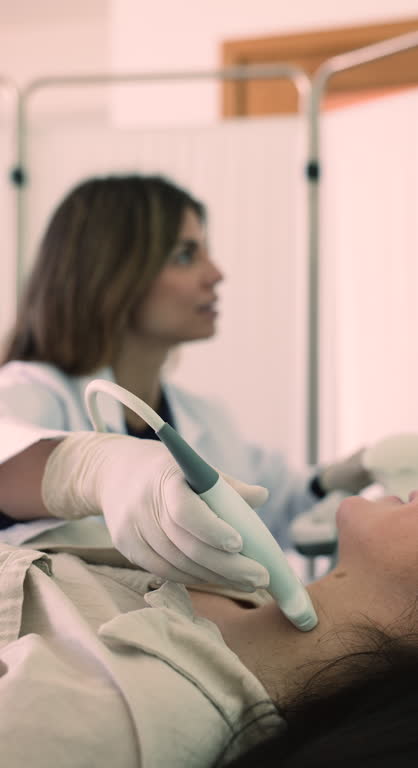 Doctor check patient thyroid gland using ultrasonography equipment