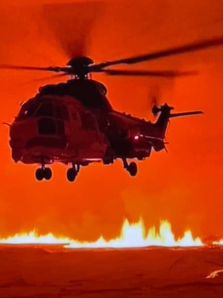 istock Rescue helicopter in action during a fire 2163878139
