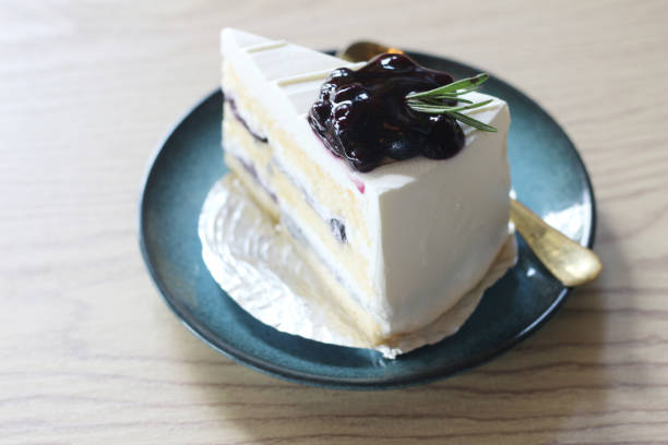 istock piece of blueberry cake 2163879493