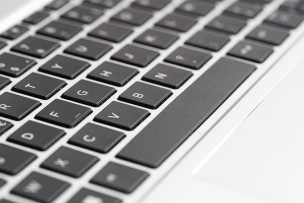 Gray netbook with black keys. Portable PC for ffficient communication and connectivity.