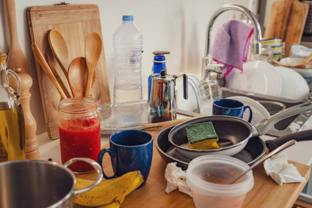 istock Messy kitchen counter with dirty dishes and cooking pots 2163887558