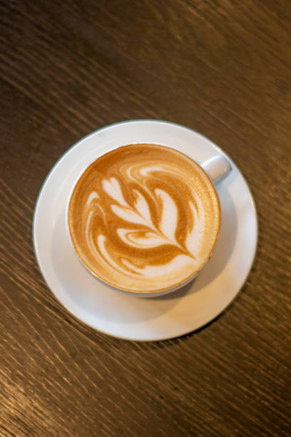 istock A Cup of Coffee Latte On a Wooden Table 2163889026