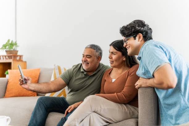 istock Family taking a selfie at home 2163890076