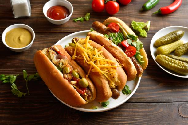 istock Homemade hot dogs with different toppings 2163897071