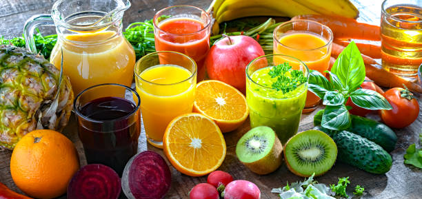 istock Glasses with fresh organic vegetable and fruit juices 2163898999