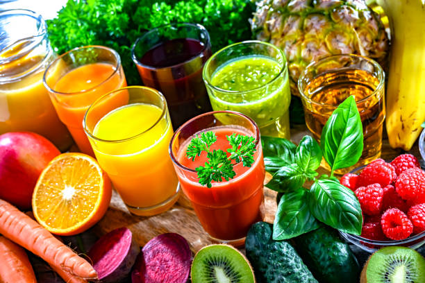 istock Glasses with fresh organic vegetable and fruit juices 2163899014