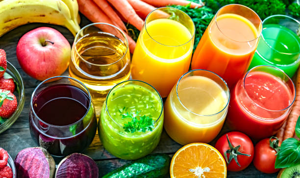 istock Glasses with fresh organic vegetable and fruit juices 2163899049