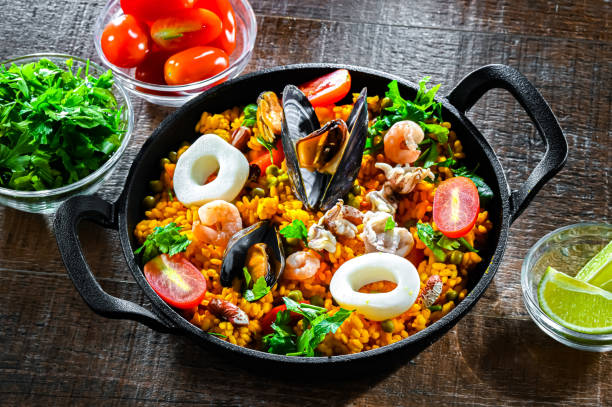 istock Seafood paella served in a cast iron pan 2163899344