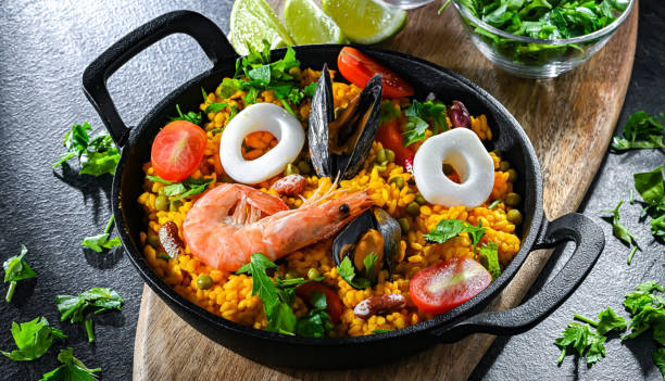 istock Seafood paella served in a cast iron pan 2163899363
