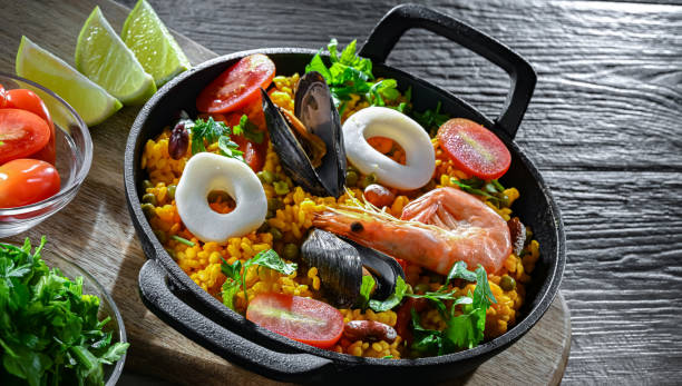 istock Seafood paella served in a cast iron pan 2163899379