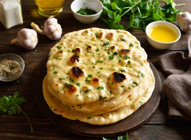 istock Homemade indian naan bread with garlic butter 2163900611