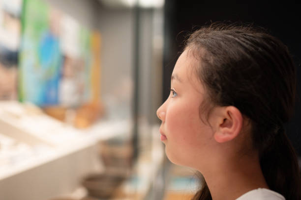 istock A girl looking at something seriously 2163902343