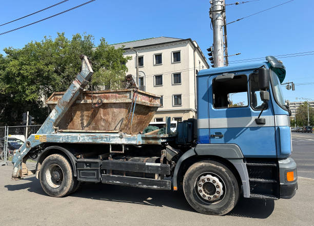 istock Truck with a large industrial garbage can 2163912315