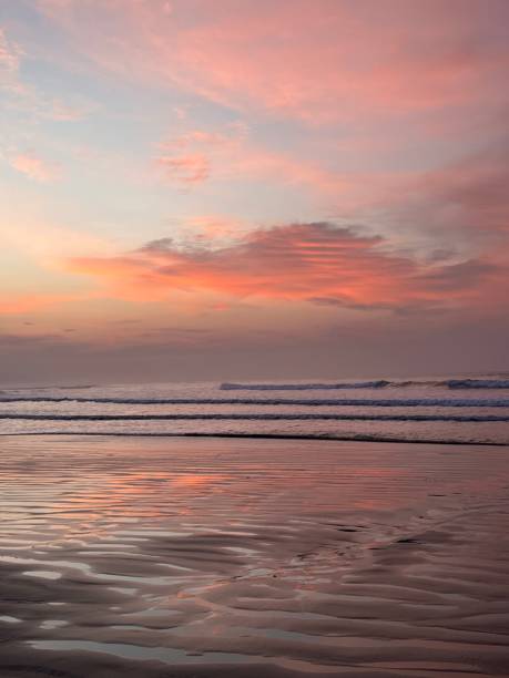 istock Reddish sunrise on the beach 2163912580