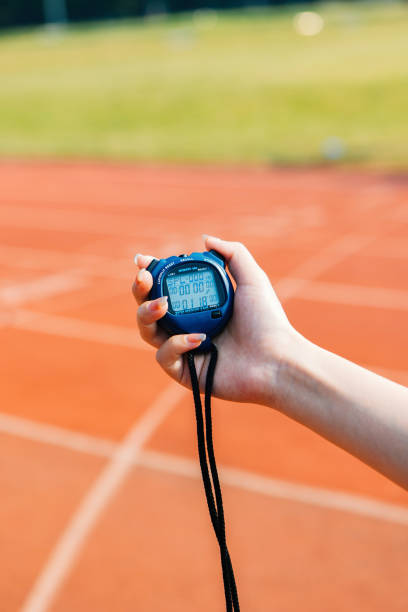 istock The referee is holding a stopwatch. Start running timer 2163917185